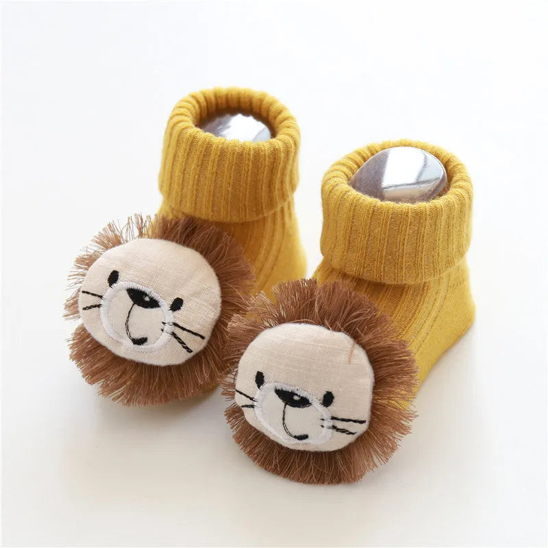 Cotton baby floor socks in a pink bow pattern, shown on an infant's feet.