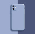 Silicone phone case for iPhone 11 series in various solid colours including red, green, and black.