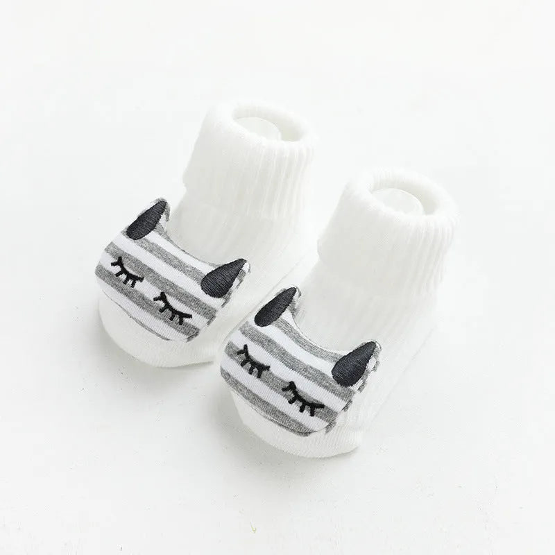 Baby socks with silicone anti-slip grips on sole, mid-height tube design in combed cotton
