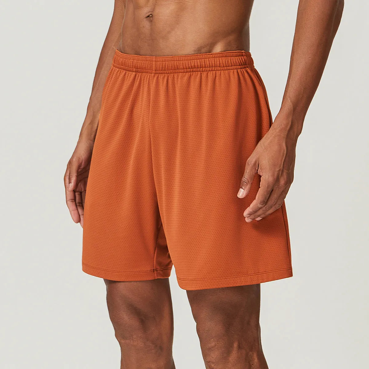 Men's quick-dry running shorts in sky green, showing double-layer construction and mid-waist short length.