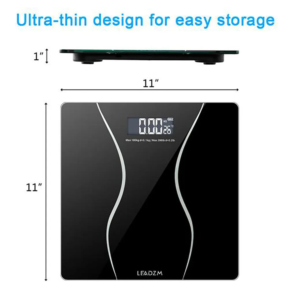 Black electronic digital bathroom scale on a hard floor, showing a weight reading on its display.