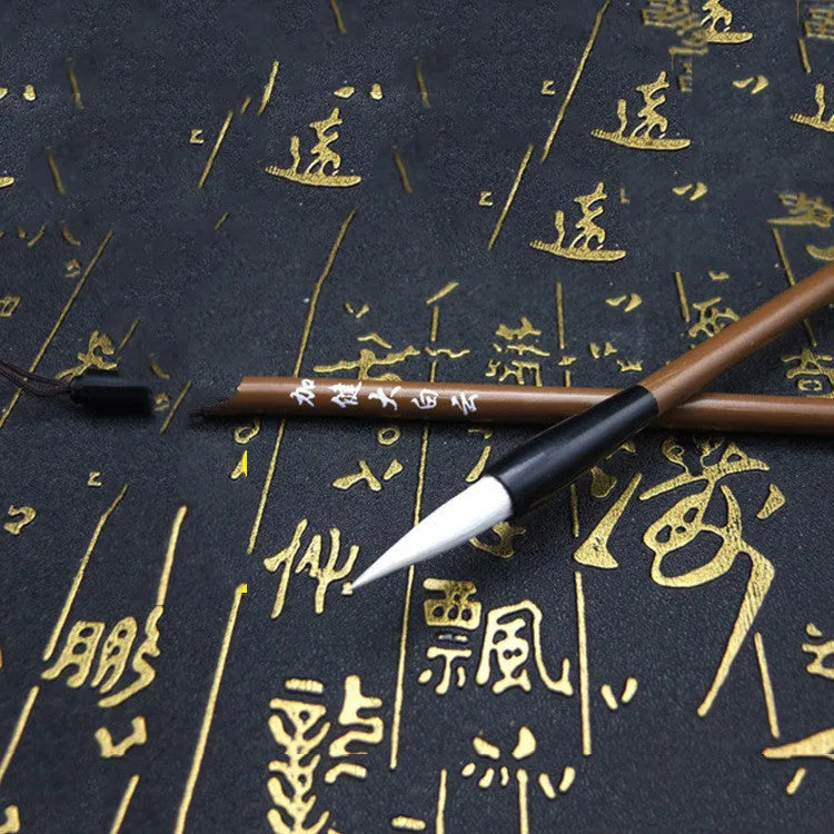 The Cloud Brushes calligraphy brush set with solid wood or bamboo handles in three sizes S M L brown white
