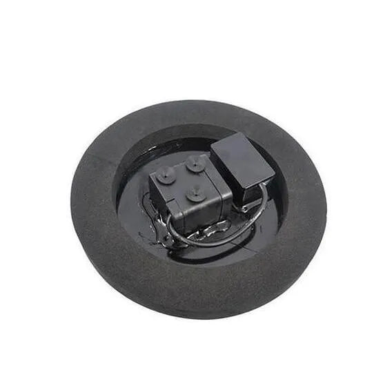 Black solar-powered water fountain pump with four spray nozzles, placed in a birdbath.