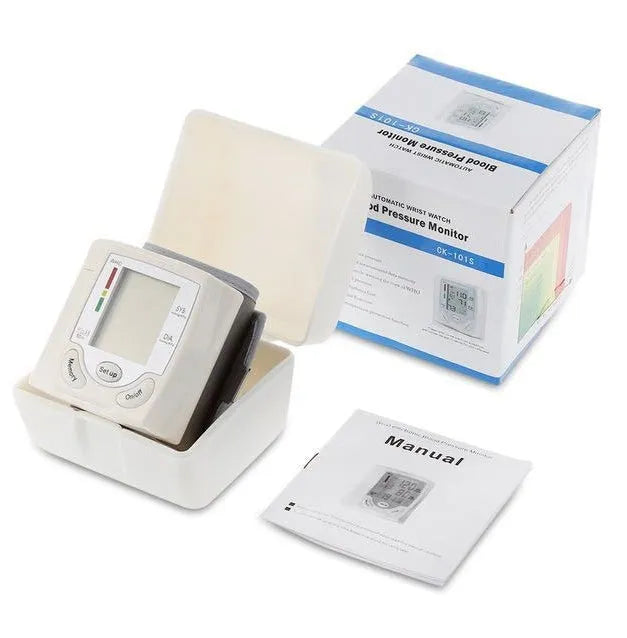 Grey wrist blood pressure monitor with compact rectangular design and display screen