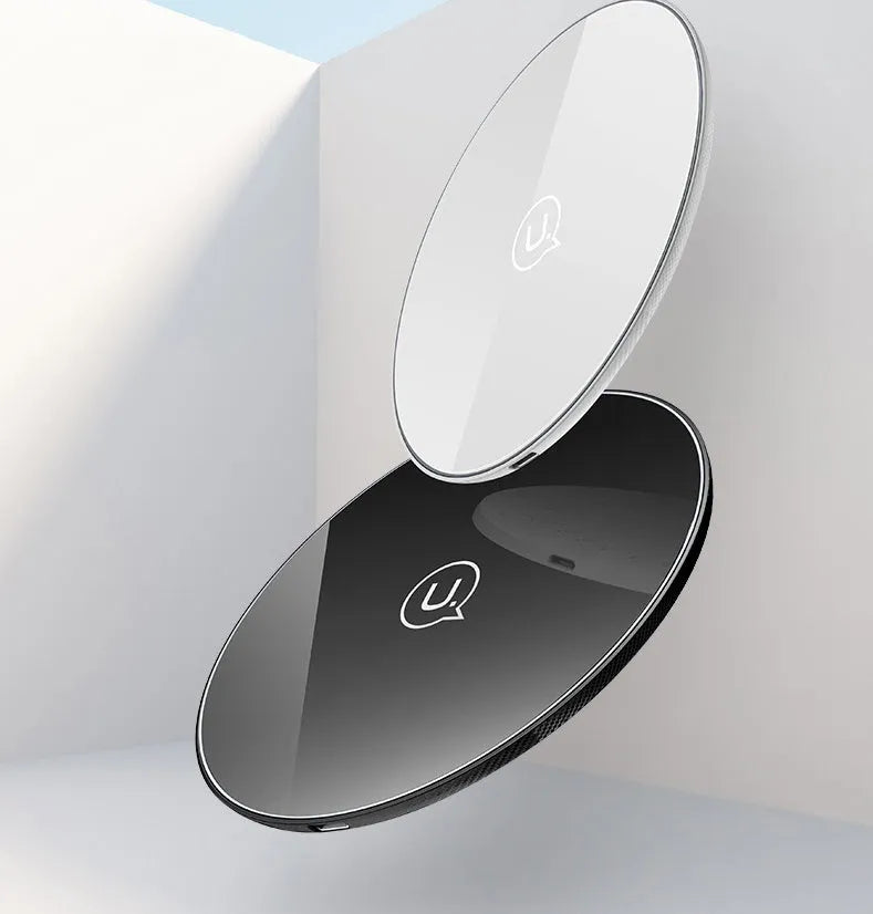 Glass disc wireless charger for smartphones in black or white with charging indicator