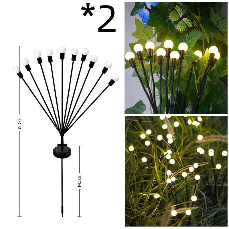 Solar-powered LED garden stake light with multiple heads on a stainless steel spike, showing warm white and coloured light modes.