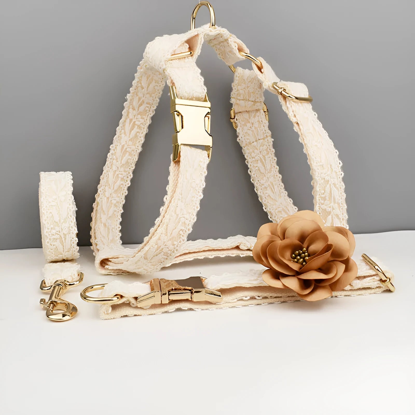 Pet wedding accessories set showing lace vest, floral collar, and adjustable leash for dogs