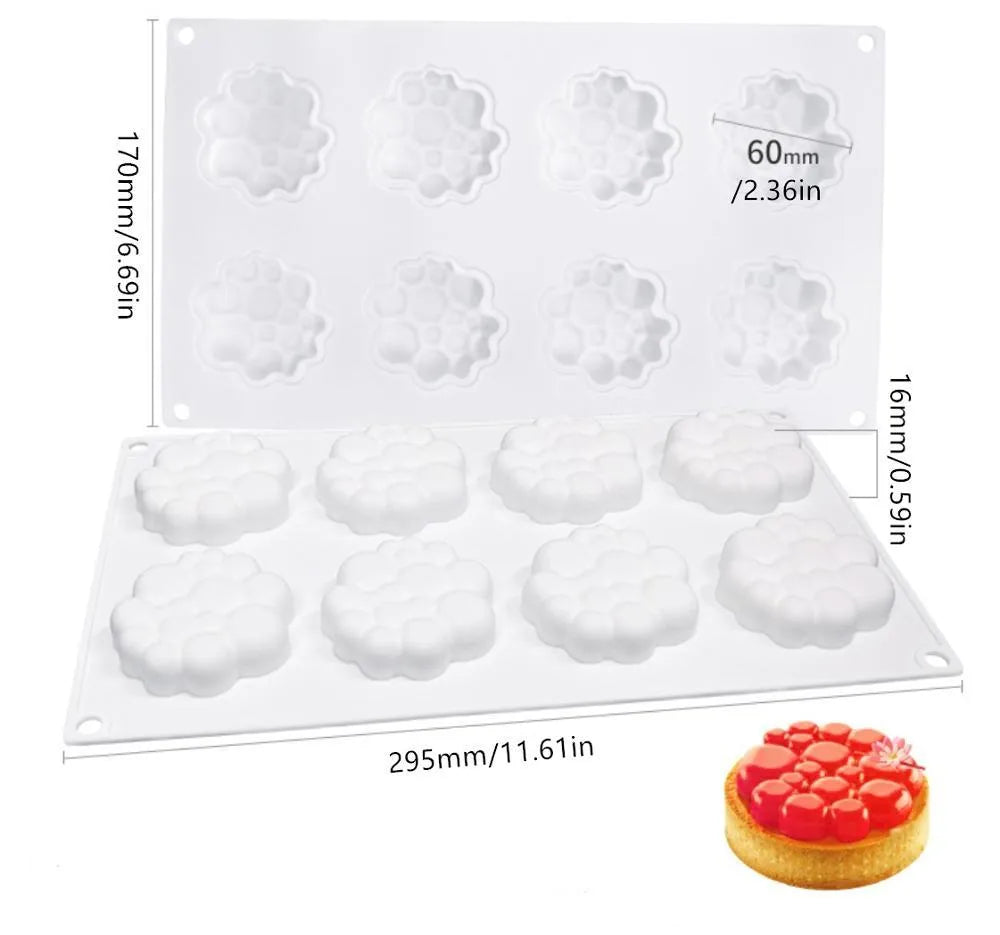 Round silicone baking mould with 8-bubble patterned base for cakes and desserts.