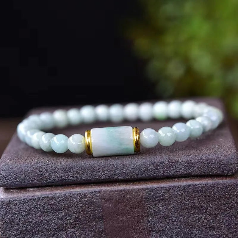 Natural Myanmar jade round beads bracelet in emerald green with ethnic geometric design