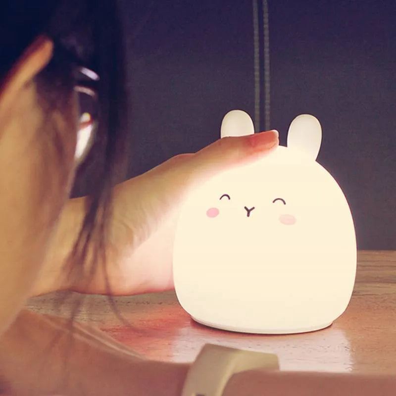 Cute rabbit-shaped silicone night light with LED illumination for children's bedrooms