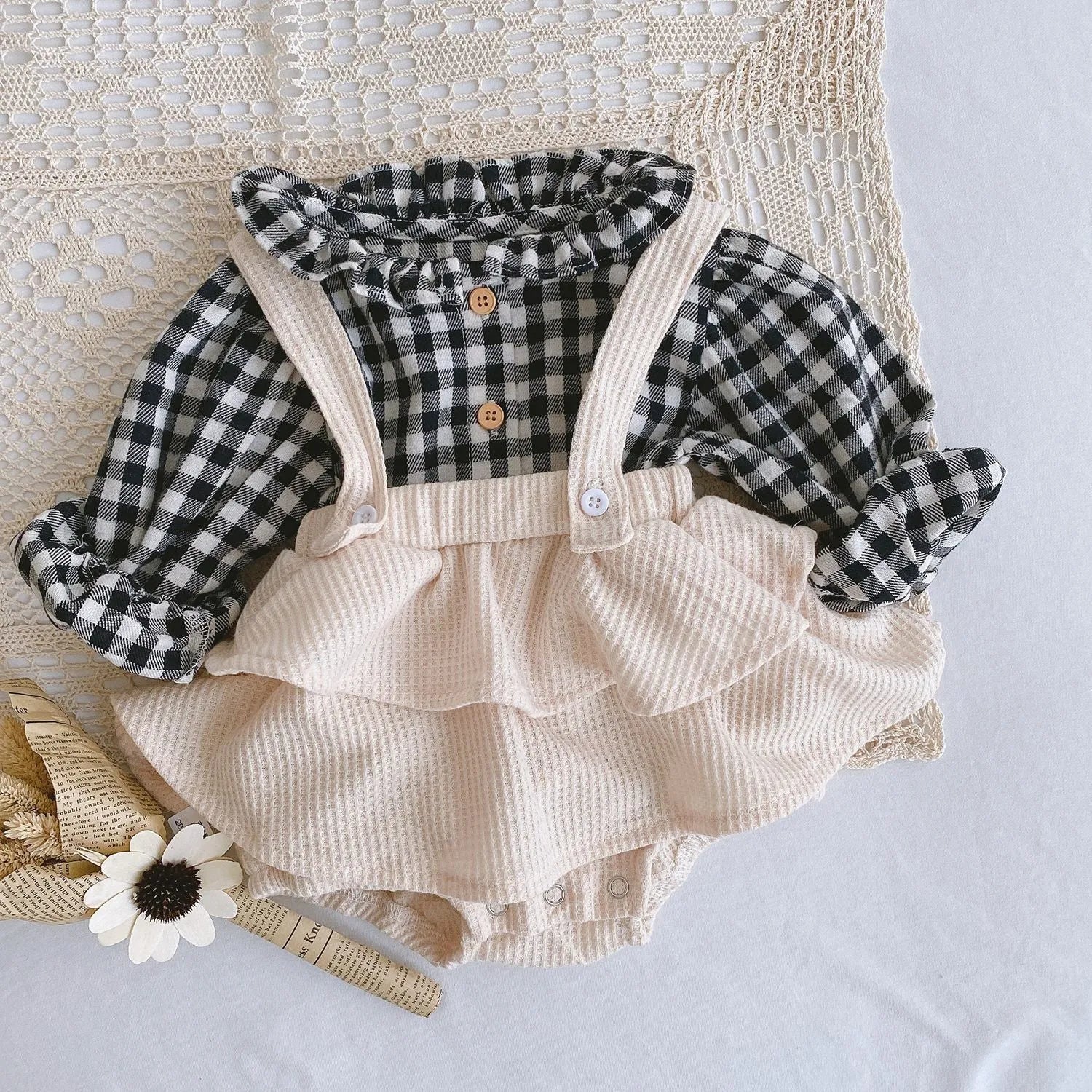 Baby romper climber suit with triangle design and pleated lotus leaf sling in cotton fabric