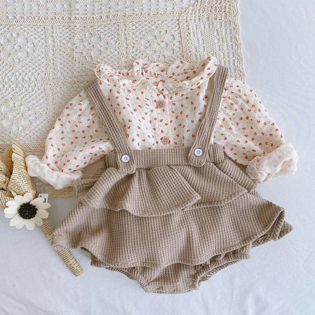 Baby romper climber suit with triangle design and pleated lotus leaf sling in cotton fabric