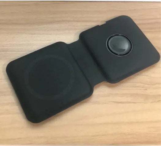 White foldable dual magnetic wireless charging dock showing 15W QI fast charging for two phones.