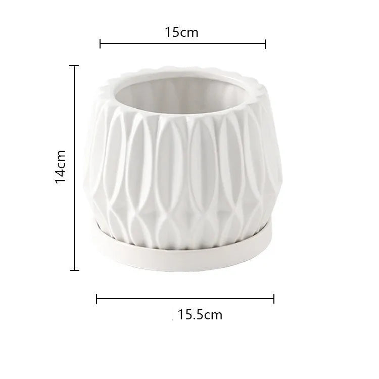 Medium grey ceramic tabletop plant pot for flowers and green plants