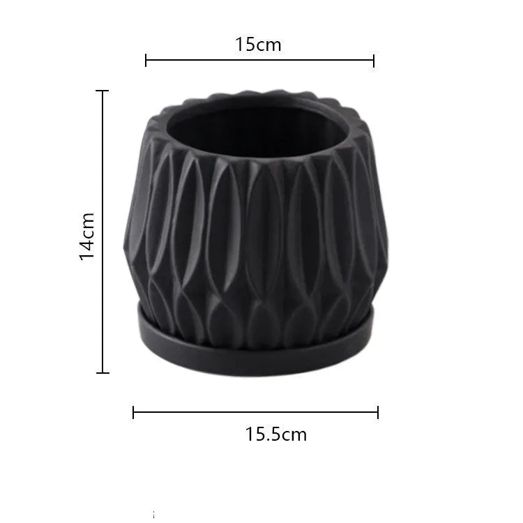 Medium grey ceramic tabletop plant pot for flowers and green plants