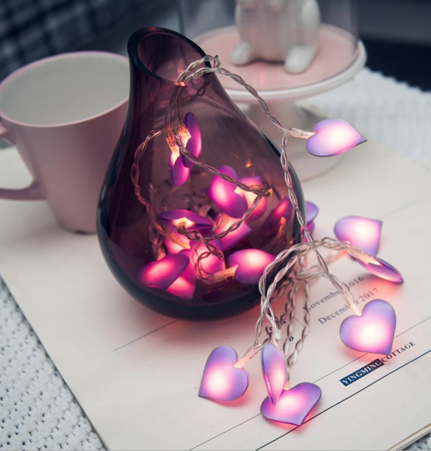 Pink and purple LED fairy string lights with heart and star shapes for bedroom decoration