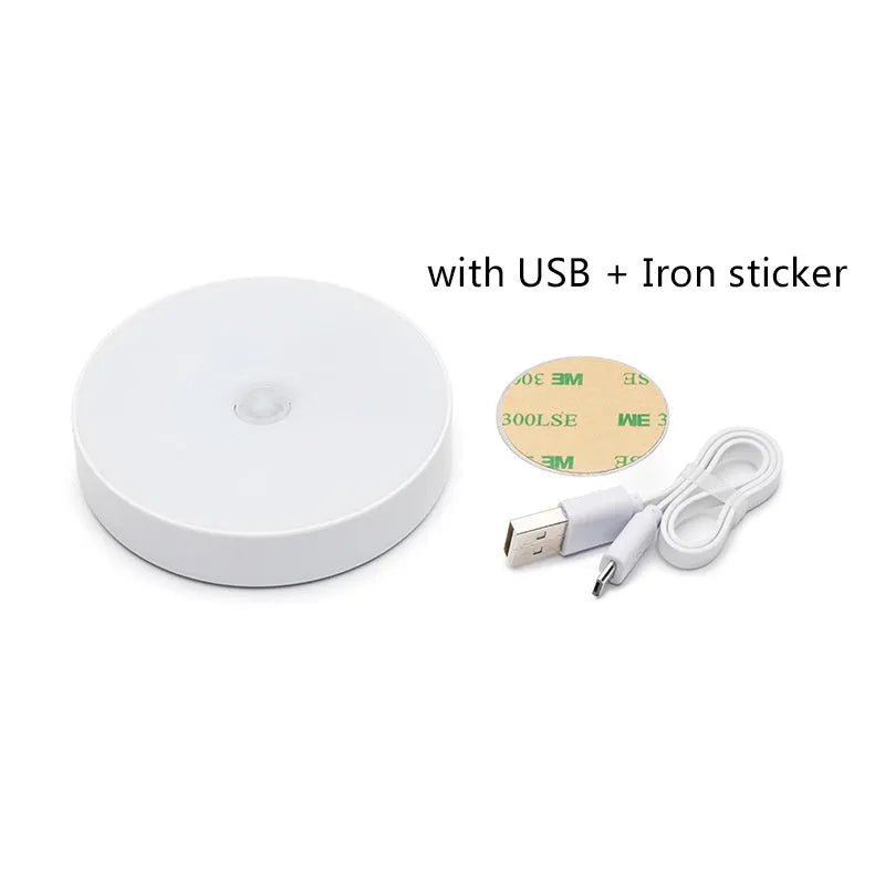 Small white round motion sensing LED night light with USB charging port