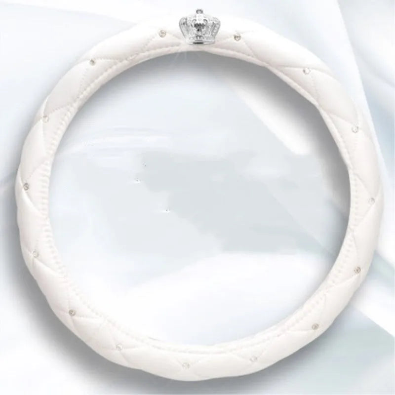 Women's diamond steering wheel cover with 5A Czech imported rhinestones in pink and white on a black car steering wheel