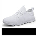 Men's black and white breathable mesh casual sneakers with lace-up closure and PVC sole.