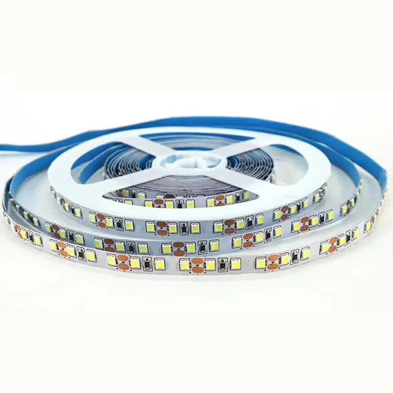 Close-up of a flexible white 12V LED light strip with either 2835 or 5050 chips, designed for shelf lighting.