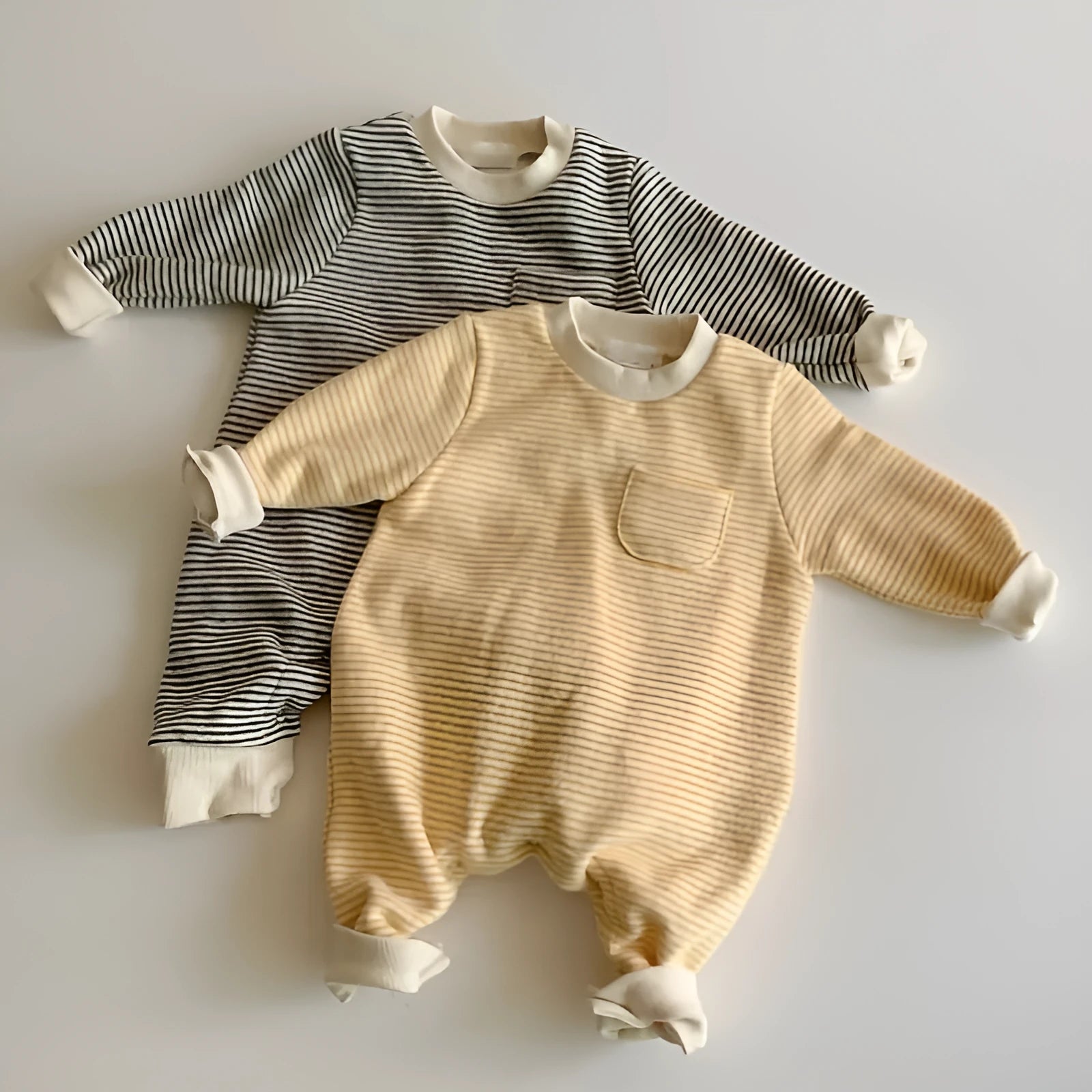 Striped cotton baby jumpsuit with long sleeves in yellow or black colour options