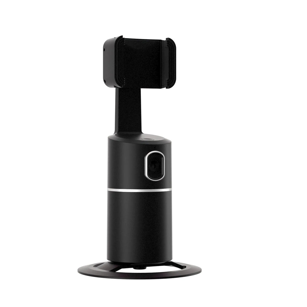 Black smartphone tracking gimbal stabiliser showing 360-degree rotation on a desk.