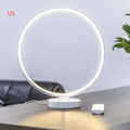 White full moon lamp with remote control on table showing adjustable colour temperature settings