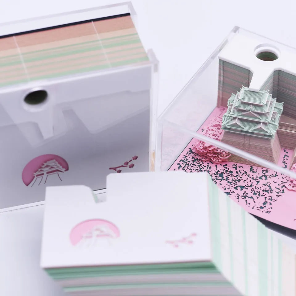 Hayao Miyazaki Spirited Away Tianshou Tower three-dimensional papercraft model kit in gold, pink, or white.