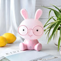 USB-powered cartoon rabbit night light with glasses, available in blue, green, and pink colours