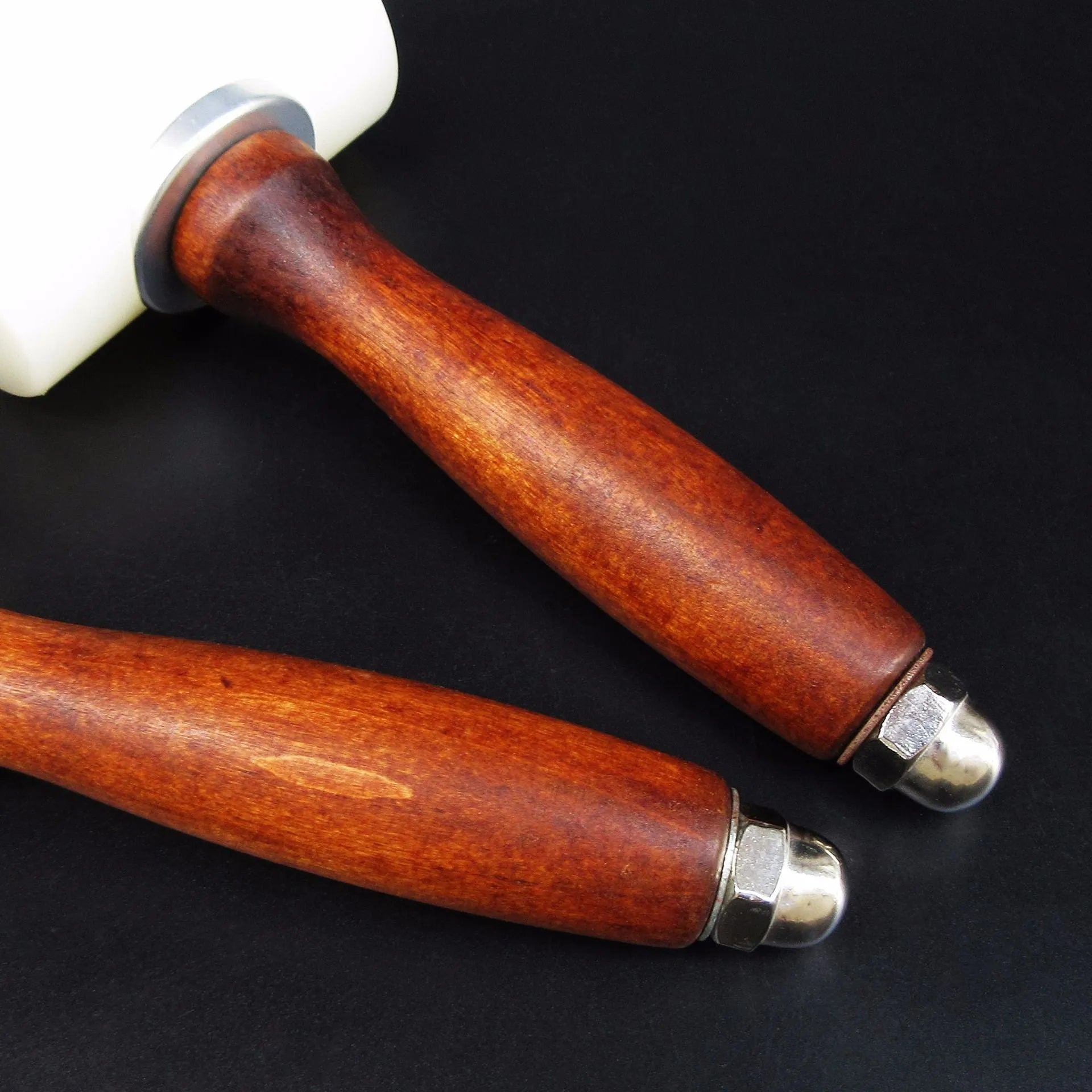 Nylon-headed leather carving hammer with brown wooden handle for punching and engraving leather
