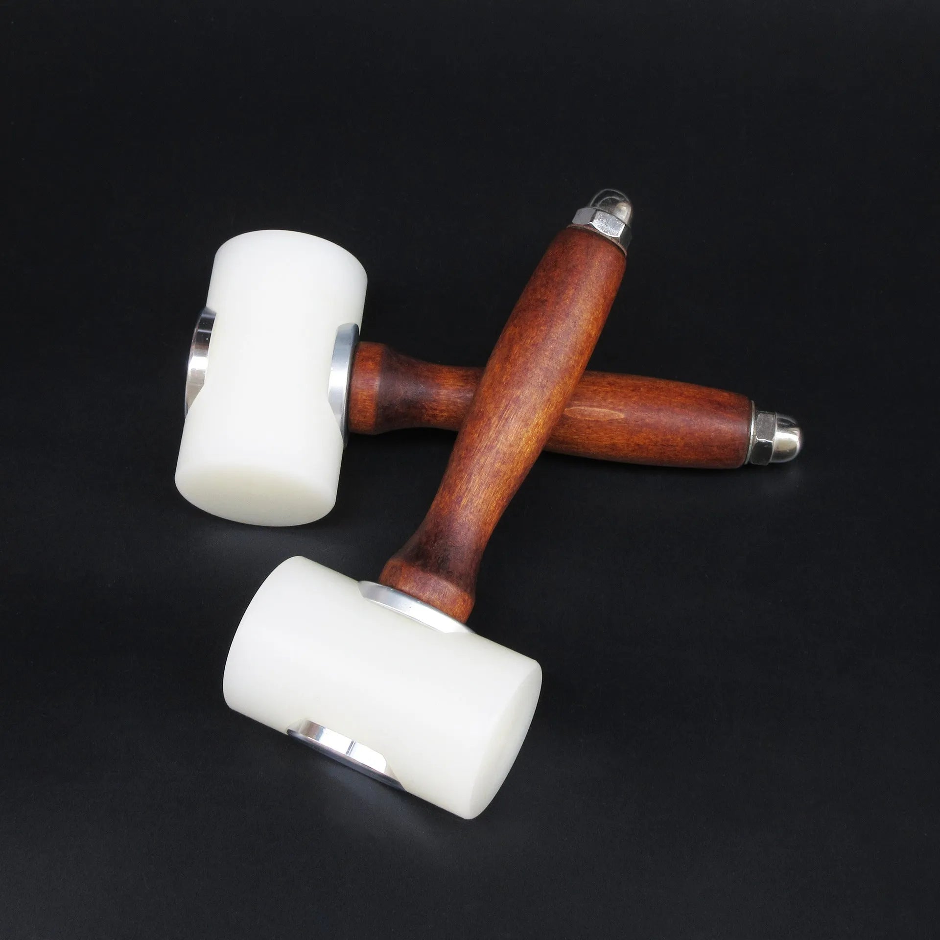 Nylon-headed leather carving hammer with brown wooden handle for punching and engraving leather