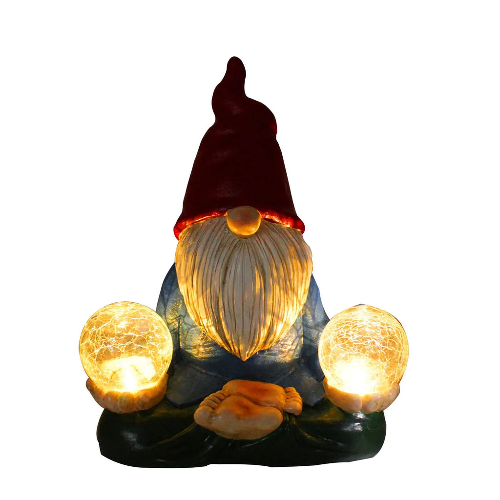 Solar LED resin dwarf doll garden ornament with faceless old man design, shown outdoors.
