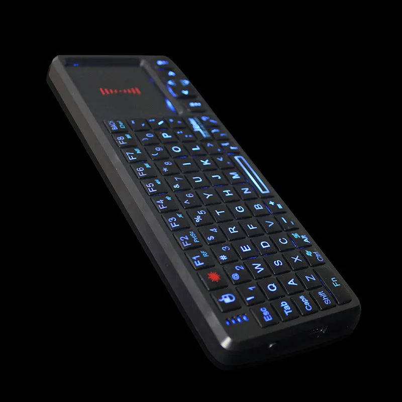 Black wireless laser teaching mini keyboard with a small touch screen, shown with USB receiver.