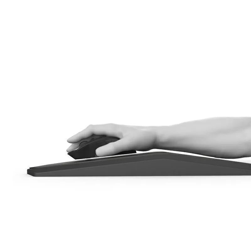Black three-dimensional geometric mouse pad with honeycomb support structure, 35.8x21x2.8cm, on a desk