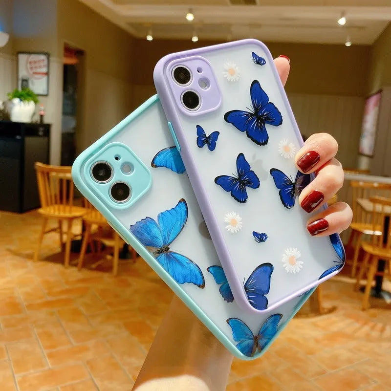 Clear acrylic iPhone case with soft edges showing butterfly design in light blue colour