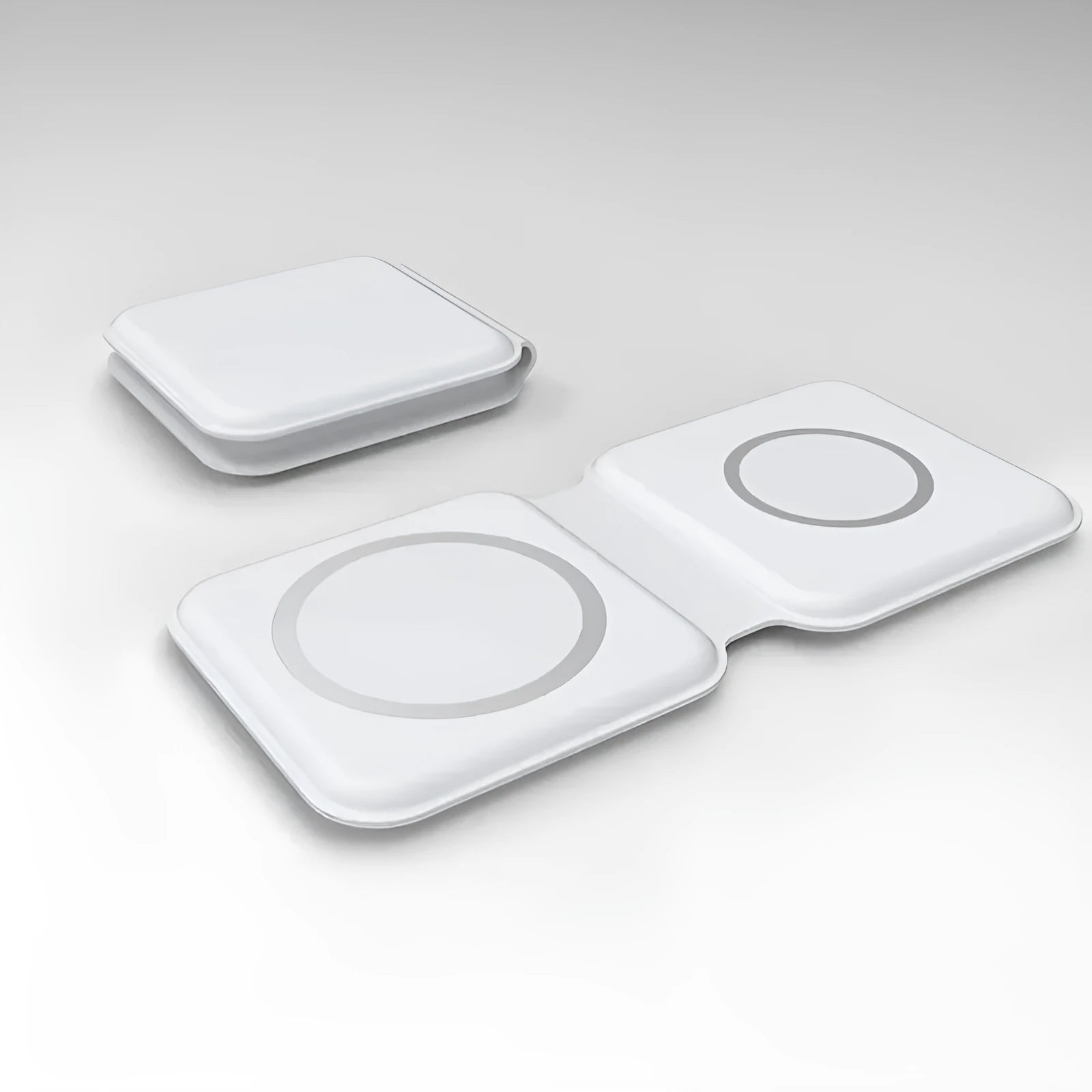 White foldable dual magnetic wireless charging dock showing 15W QI fast charging for two phones.