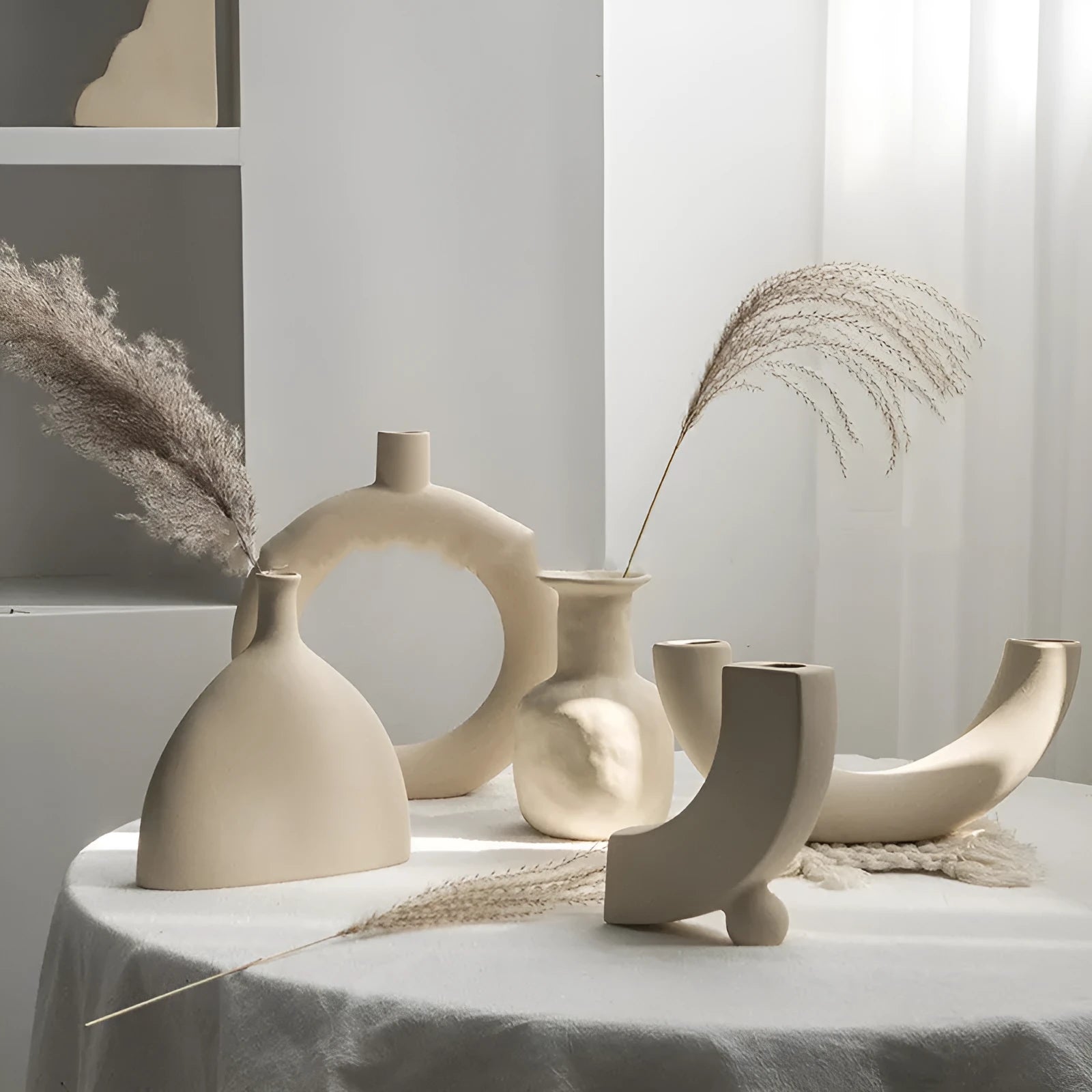 Unglazed matte ceramic dry flower vase with textured surface in Nordic style