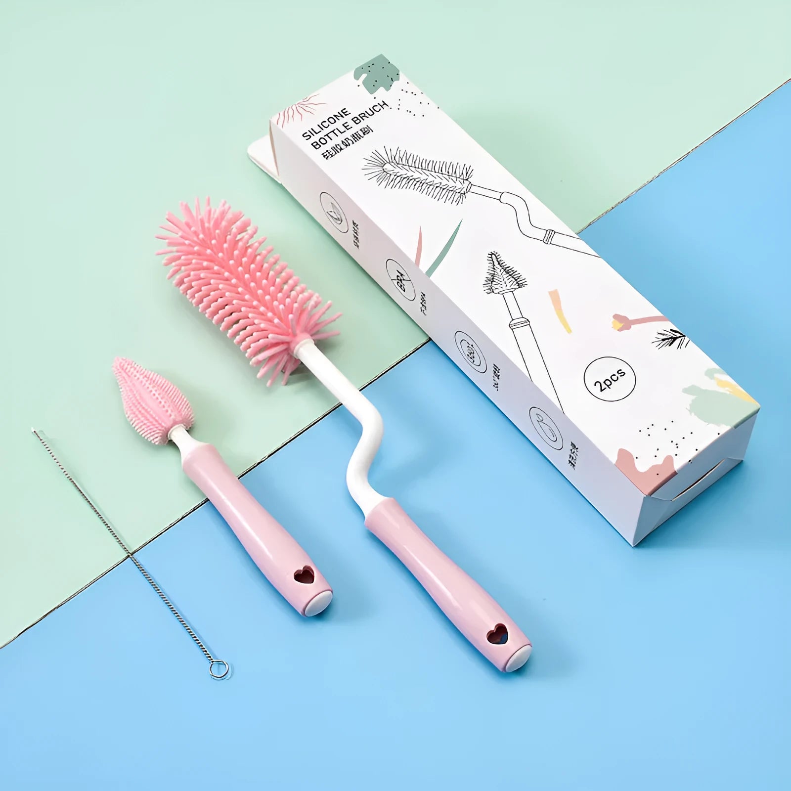 Baby silicone bottle brush set in pink, blue, and yellow for cleaning straws and nipples