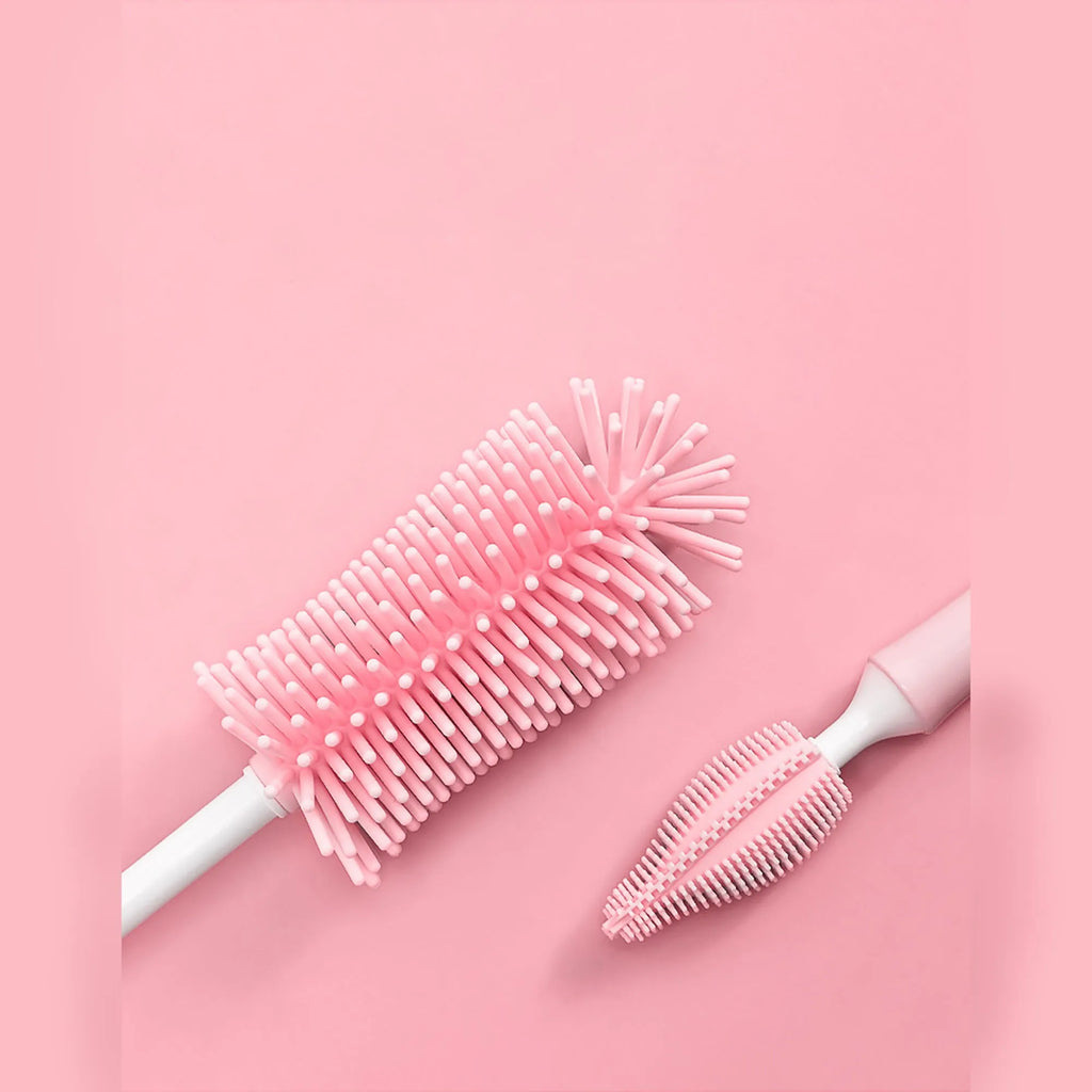 Baby silicone bottle brush set in pink, blue, and yellow for cleaning straws and nipples