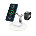 Black circular wireless charging station with magnetic surface for phone and accessories