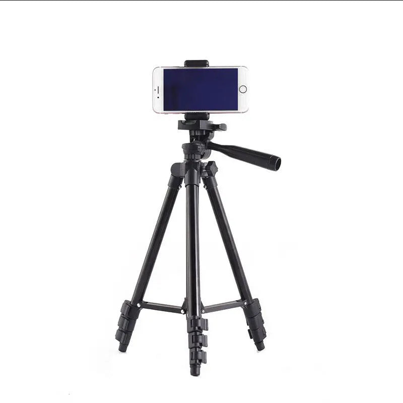 Black aluminium portable tripod with 4-section legs extended, showing 3D head and quick-release plate.