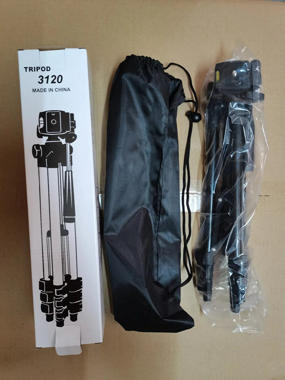 Black aluminium portable tripod with 4-section legs extended, showing 3D head and quick-release plate.