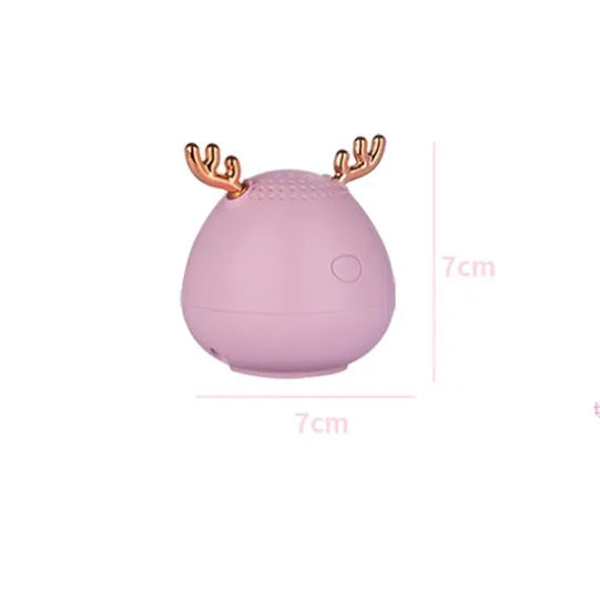 Compact Bluetooth wireless speaker with USB port, available in green, pink or white colours