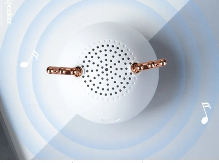 Compact Bluetooth wireless speaker with USB port, available in green, pink or white colours