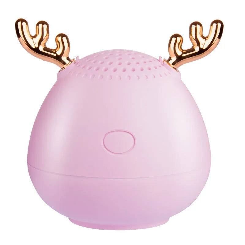 Compact Bluetooth wireless speaker with USB port, available in green, pink or white colours