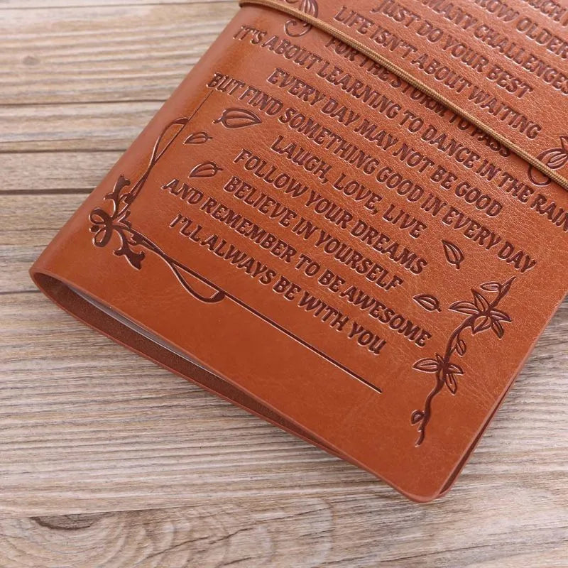 Leather business notebook hand ledger with strap binding showing 105mm x 190mm dimensions and brown acid-free paper