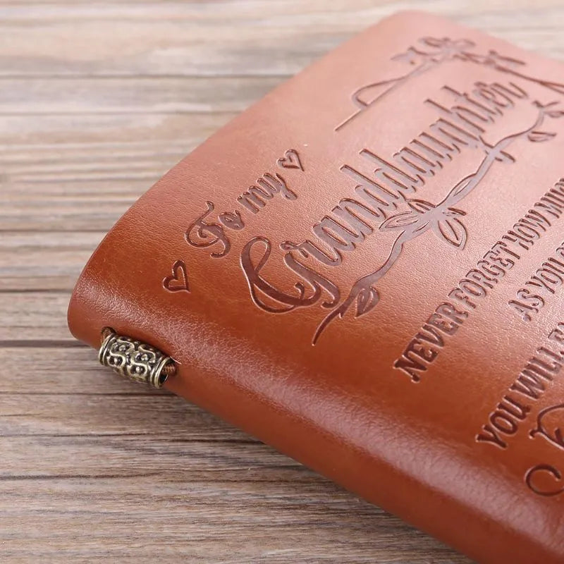 Leather business notebook hand ledger with strap binding showing 105mm x 190mm dimensions and brown acid-free paper