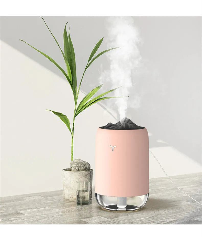 Magic Flame ultrasonic humidifier mini aroma diffuser in white, columnar shape, with USB cable, for home desk or car use