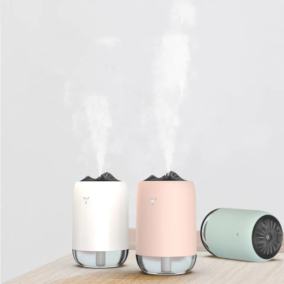Magic Flame ultrasonic humidifier mini aroma diffuser in white, columnar shape, with USB cable, for home desk or car use
