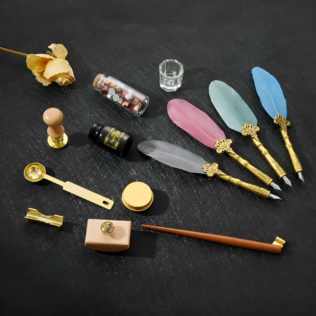 Creative dipped feather pen set with wax seal, stainless steel nib, and gift box packaging in blue colour